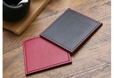 Buy Set of 4 Black Reversible Faux Leather Placemats and Coasters